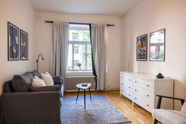 Spacious living room in Gothenburg apartment.