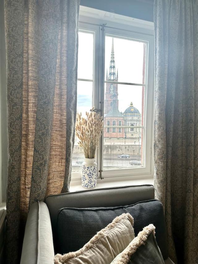 Panoramic view of living room in Old Town apartment