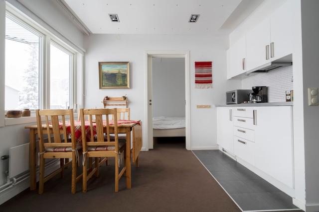 Living room in Åre apartment with sofa bed and mountain view.