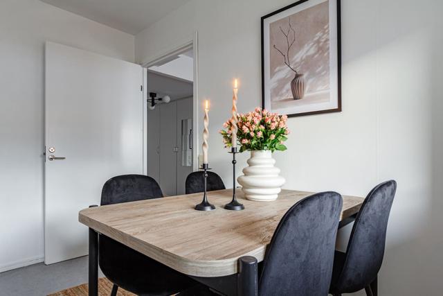 Living room with sofa bed in Södermalm studio apartment.