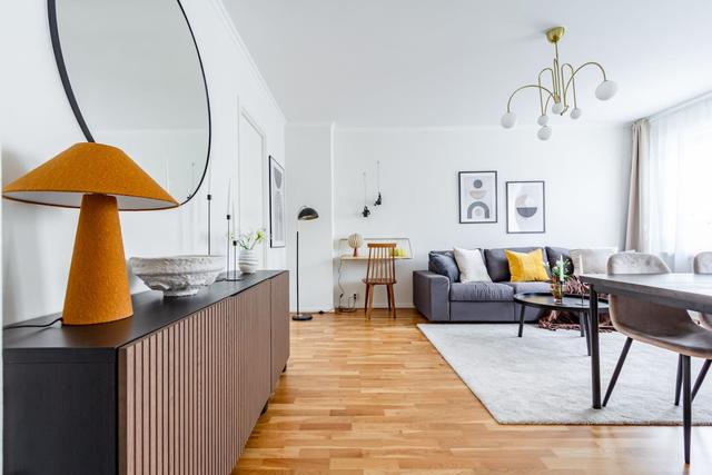 Living room with dining area in Sundbyberg