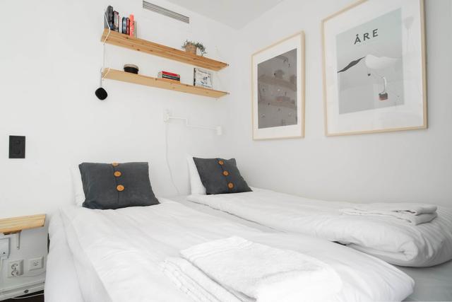Mysigt vardagsrum i Åre skidstuga, Modernt kök i Åre semesterhem, Spa-liknande badrum i Åre