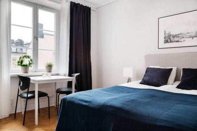 Charming Södermalm studio with compact amenities and yale door.