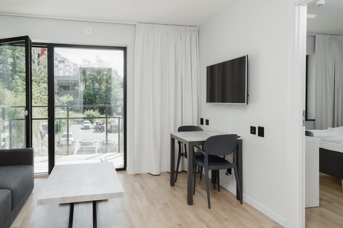 Modern one-bedroom apartment with balcony on Lidingö, perfect for remote work and relaxation.